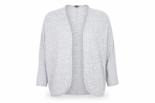 Front view of Marks & Spencer women’s blue v-neck polyester cardigan jumper, size XL