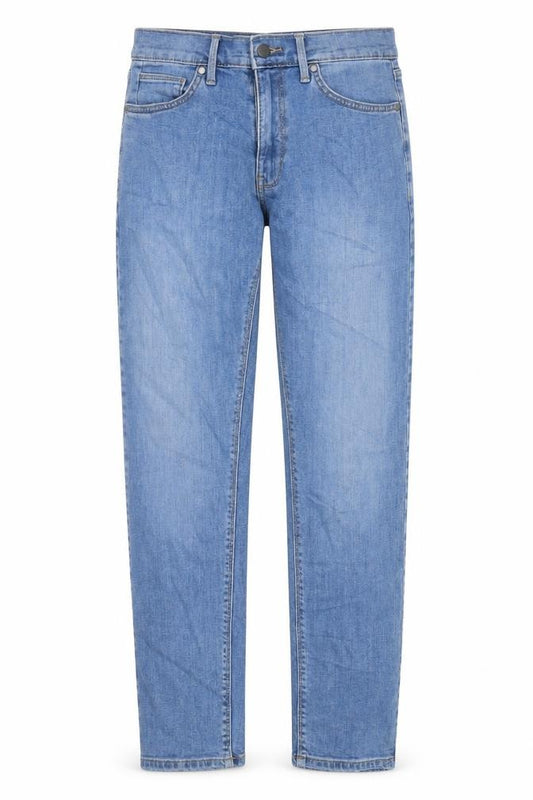 Front view of Marks & Spencer women’s blue cotton skinny jeans, size UK 30, in, 31-inch leg slim zip