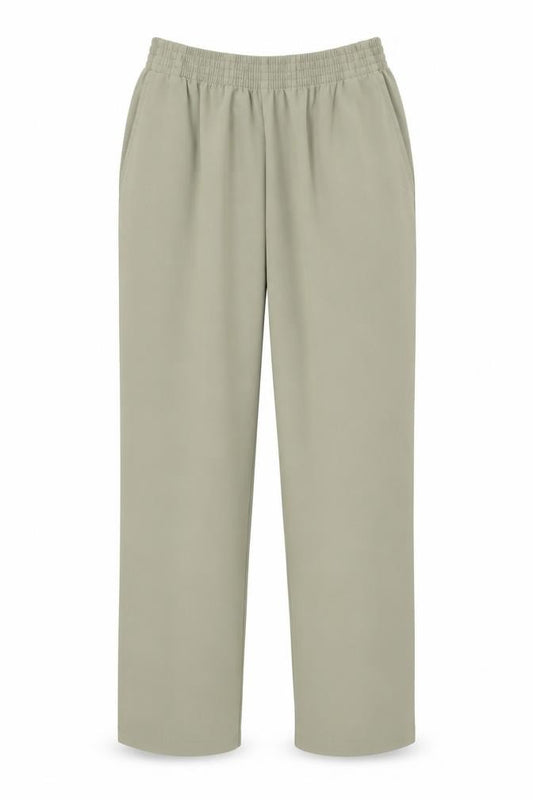Front view of Preworn women’s green polyester trousers, size UK 24, in, 29-inch leg regular