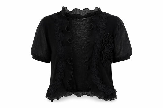 Front view of Quiz women’s black v-neck polyester cardigan jumper, size UK 12, - rose detail