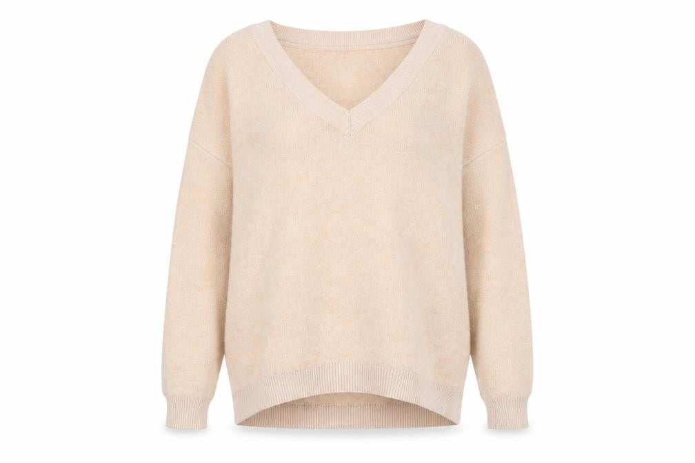 Front view of Marks & Spencer women’s pink v-neck acrylic jumper, size UK 8