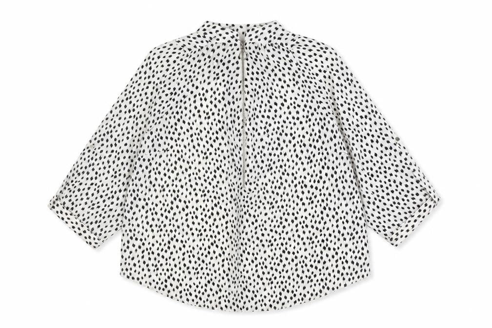 Front view of M&Co women’s white animal print polyester basic blouse, size UK 16, mock neck