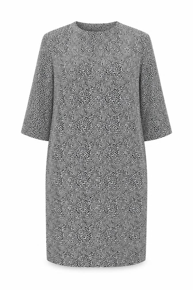 Front view of Marks & Spencer women’s white animal print polyester shift, size UK 12, v-neck pullover