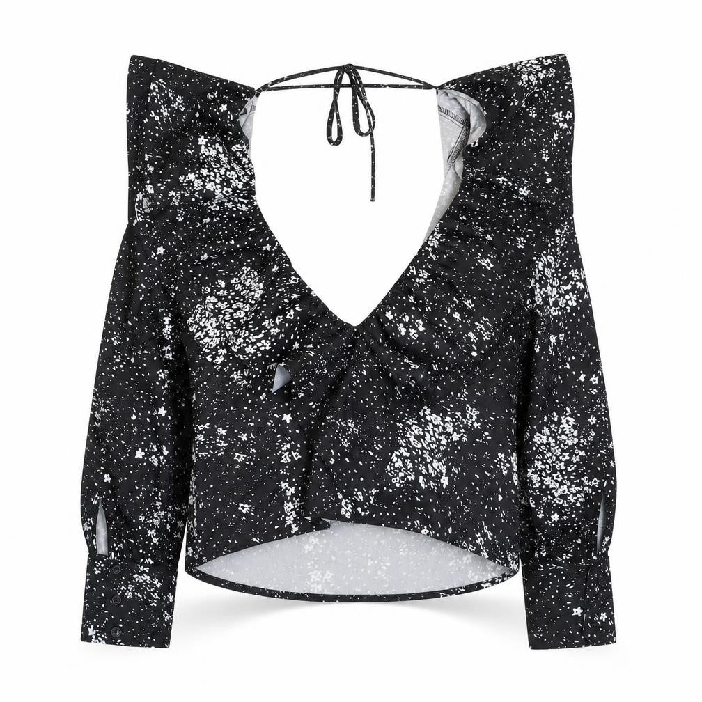 Front view of Boohoo women’s black floral polyester cropped blouse, size UK 10, halter