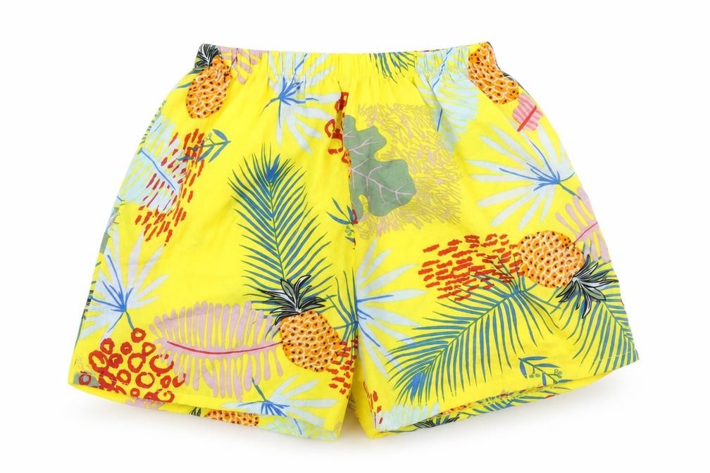 Front view of Preworn women’s yellow geometric polyester sweat shorts, size UK 6, regular