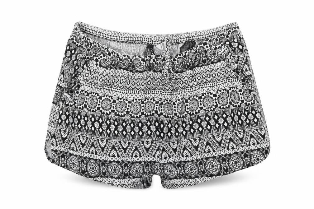 Front view of H&M women’s black geometric viscose hot pants shorts, size UK 8, 3-inch leg regular drawstring