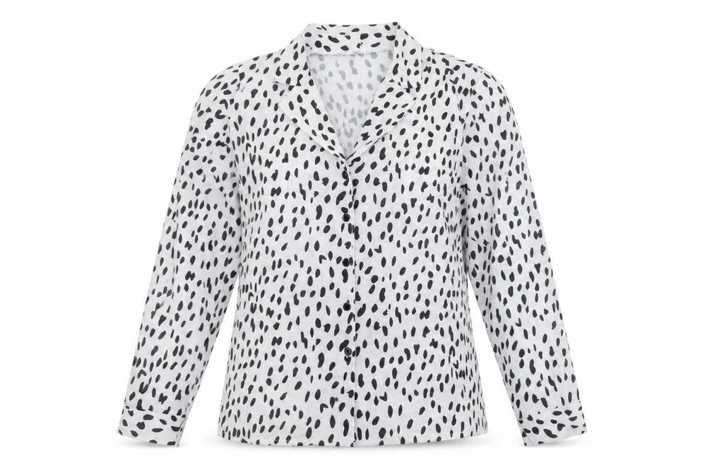 Front view of Preworn women’s white animal print polyester basic blouse, size L, collared - spotted