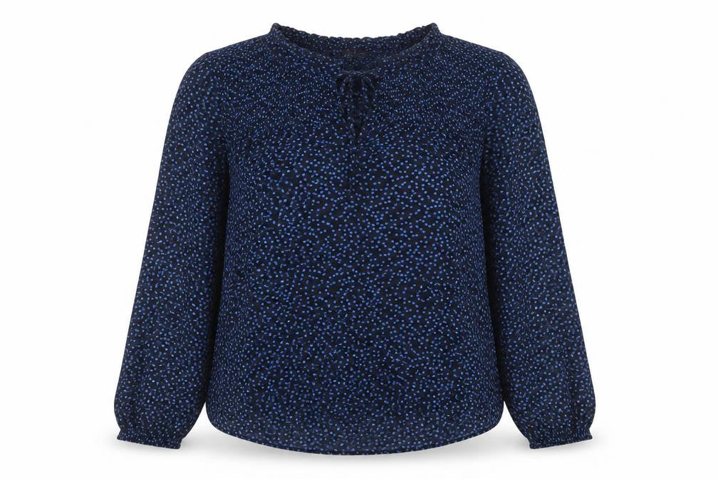 Front view of Marks & Spencer women’s blue polka dot viscose basic blouse, size UK 10, collared