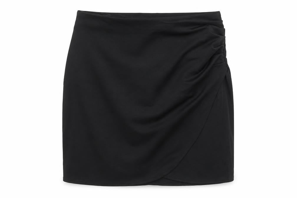 Front view of Preworn women’s black polyester mini skirt, size UK 30, in zip - ruched