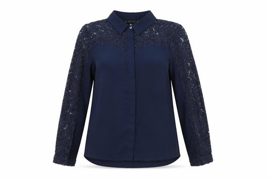 Front view of Zara women’s blue polyester jersey button-up, size S, collared