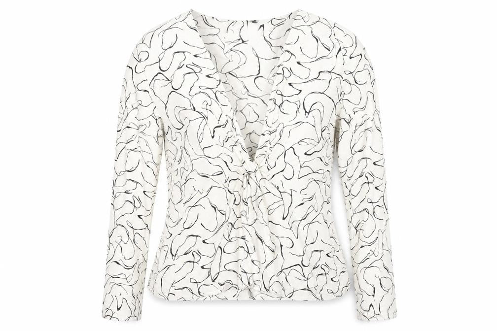 Front view of Topshop women’s white geometric viscose basic blouse, size UK 10, v-neck - buttoned cuff, peplum hem