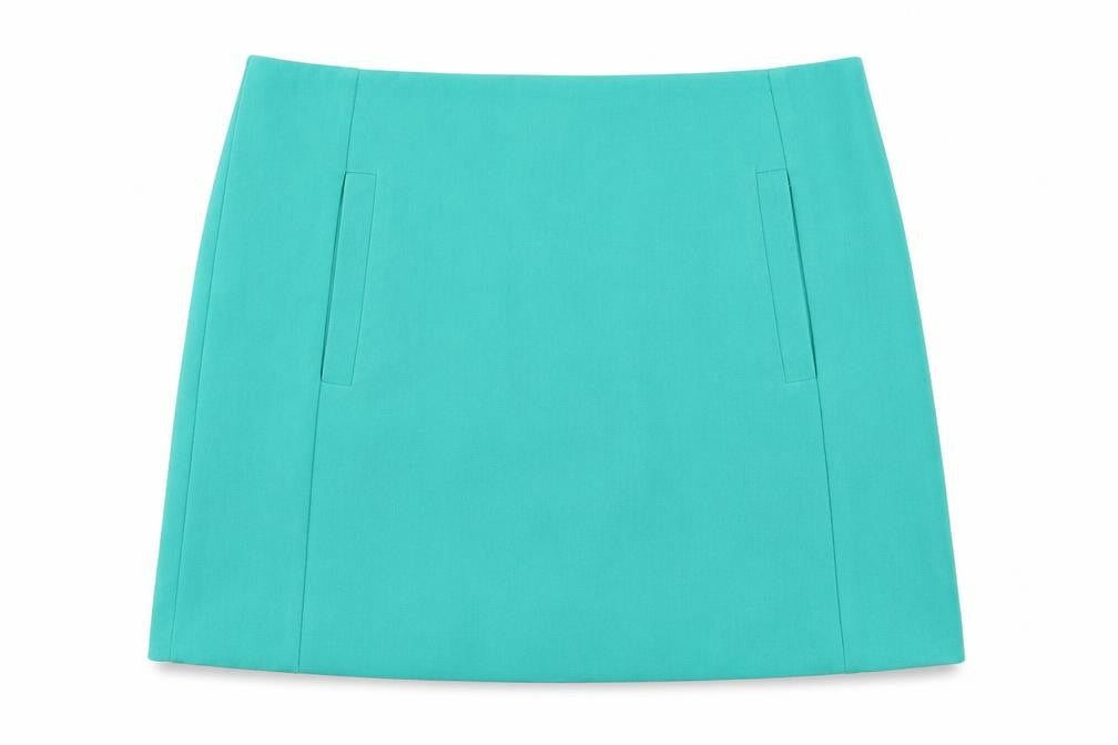 Front view of Marks & Spencer women’s green polyester mini skirt, size UK 8, zip