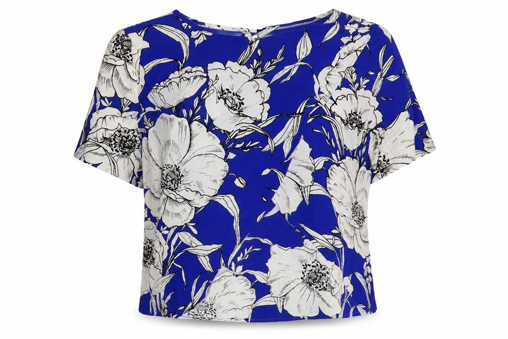Front view of Zara women’s blue floral polyester basic blouse, size M, round neck