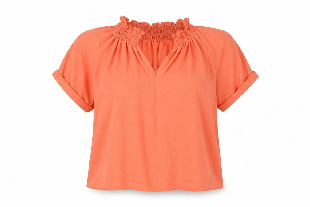 Front view of Tu women’s orange polyester basic blouse, size UK 10, v-neck