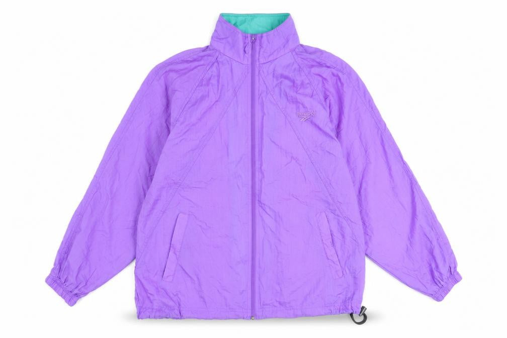 Front view of Reebok women’s purple rain coat coat, size M, zip