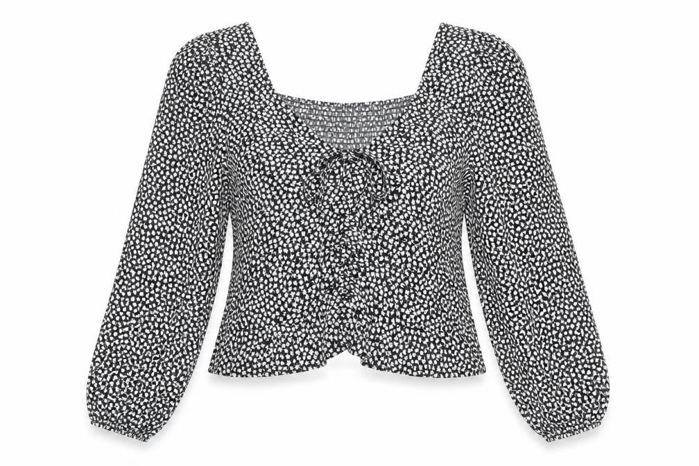 Front view of H&M women’s black floral polyester basic blouse, size L, v-neck