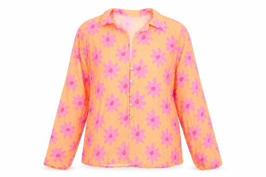 Front view of Primark women’s orange floral polyester basic button-up, size UK 8, v-neck