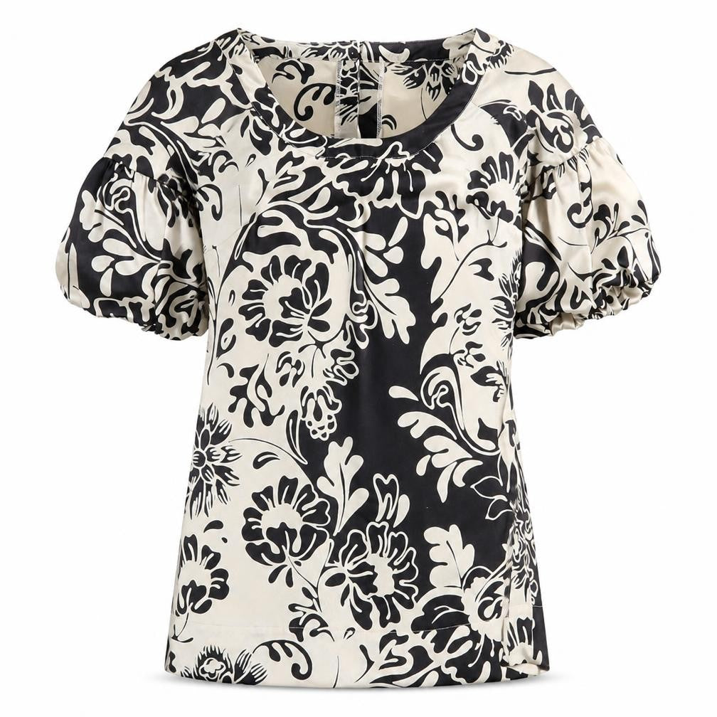 Front view of Marks & Spencer women’s black floral polyester shift, size UK 12, boat neck button