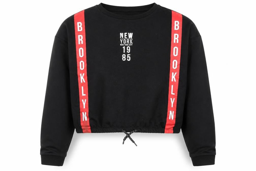 Front view of Primark girls’ black geometric cotton pullover sweatshirt, size 12-13, years drawstring