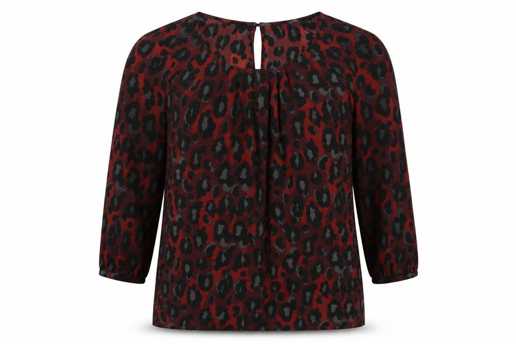 Front view of Gharani Strok women’s red animal print polyester basic blouse, size S, round neck - leopard print