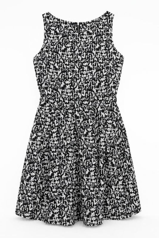 Front view of Mela London women’s black geometric polyester a-line, size UK 10, scoop neck zip