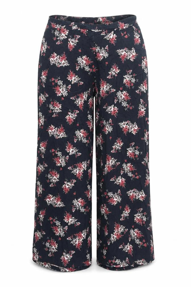 Front view of Dizzy Lizzy women’s black geometric polyester trousers, size XL, regular