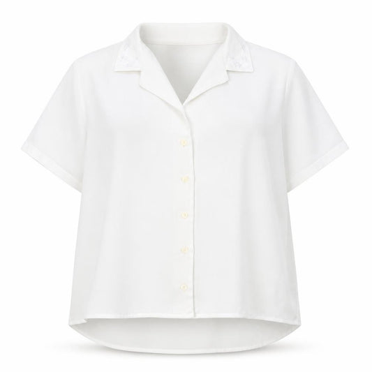 Front view of Isabell women’s ivory polyester basic button-up, size UK 18, collared
