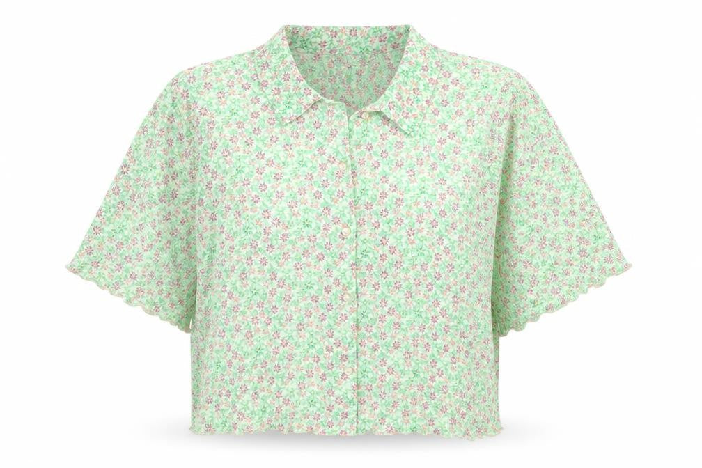 Front view of Primark women’s green floral polyester cropped button-up, size UK 14, collared
