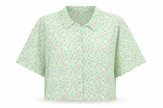 Front view of Primark women’s green floral polyester cropped button-up, size UK 14, collared