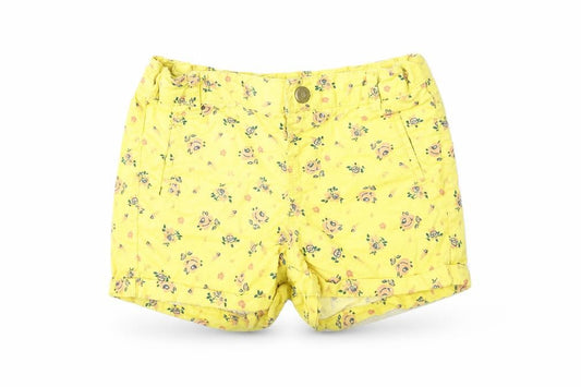 Front view of Max girls’ yellow floral 100% cotton cropped jeans, size 18-24, months button