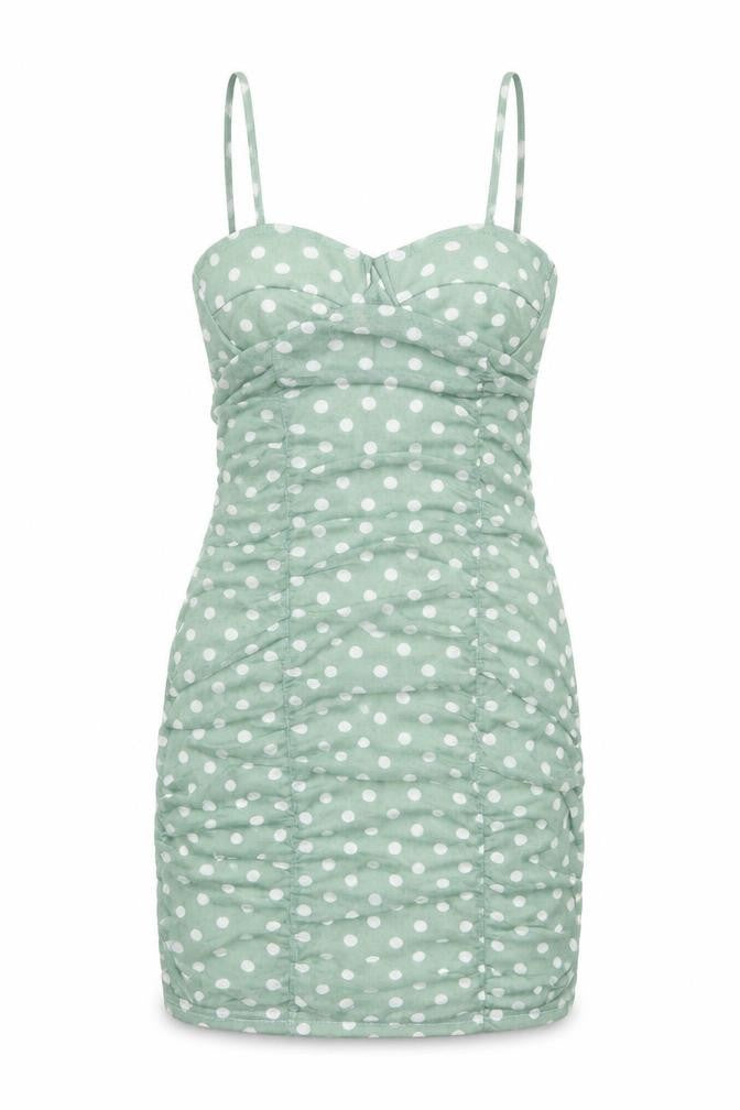 Front view of PRETTYLITTLETHING women’s green polka dot polyester slip dress, size UK 6, sweetheart pullover
