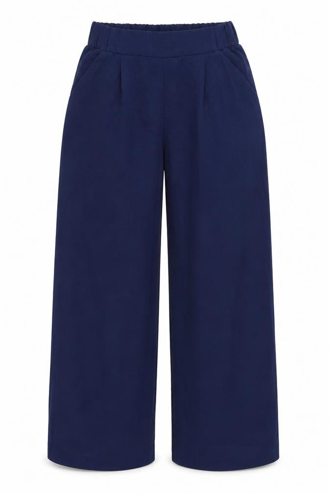 Front view of H&M women’s blue polyester trousers, size UK 6, regular