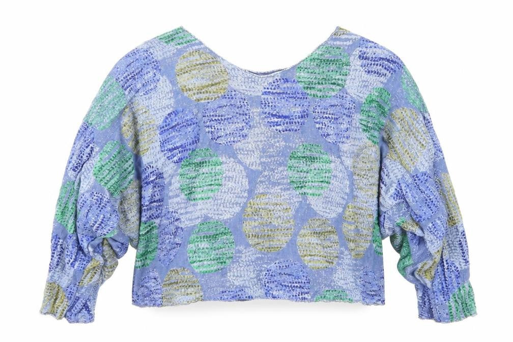 Front view of Preworn women’s blue polka dot polyester basic blouse one size v-neck