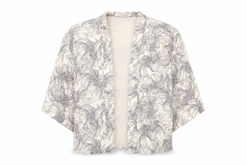 Front view of River Island women’s beige floral jacket, size UK 8