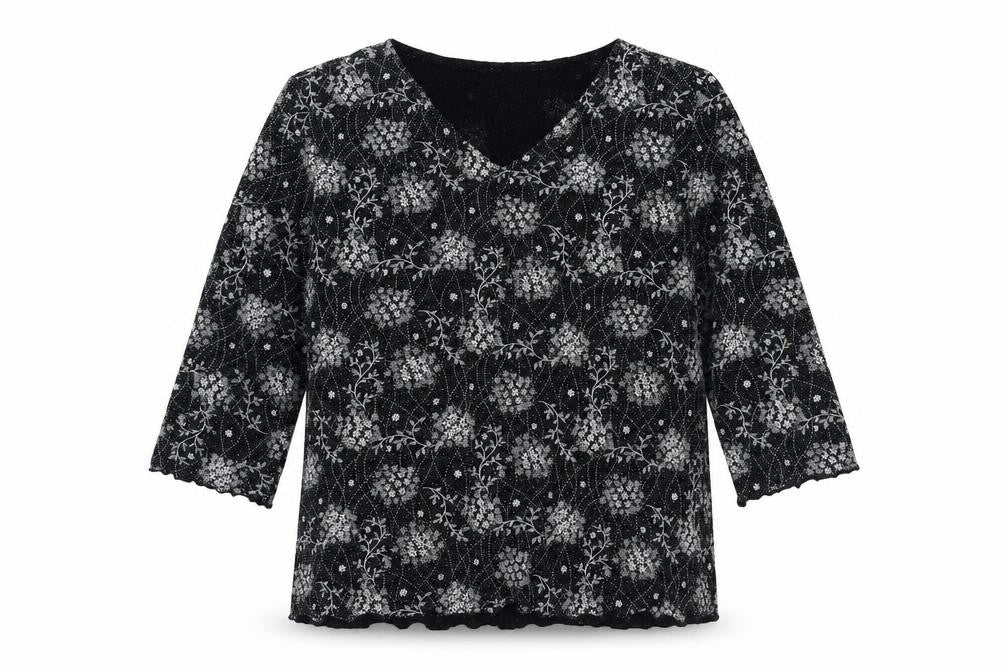 Front view of Bonmarché women’s black geometric nylon basic blouse, size M, v-neck