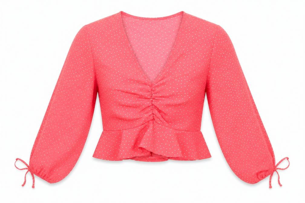 Front view of Primark women’s red polka dot polyester cropped blouse, size UK 4, v-neck