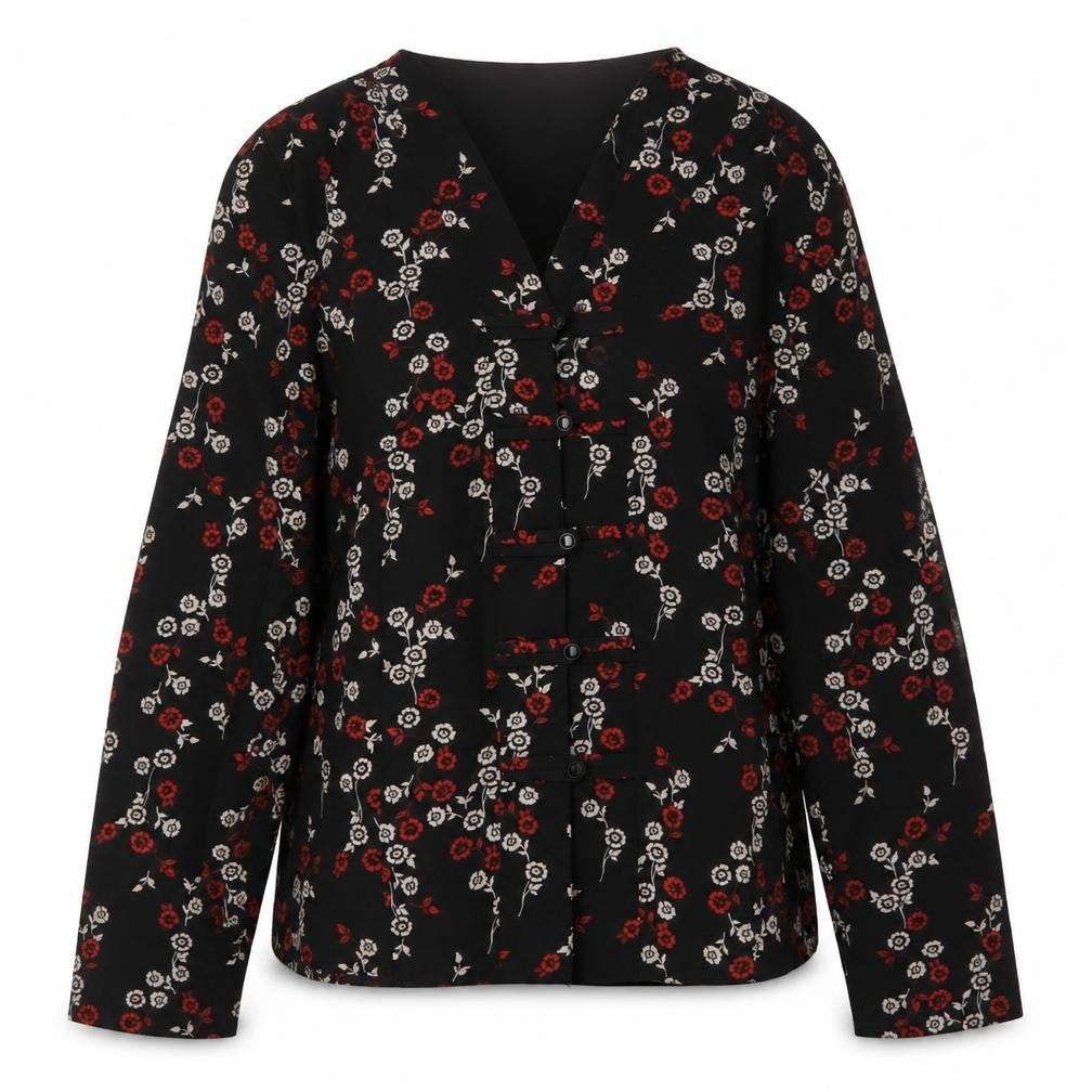 Front view of Berketex women’s black geometric polyester basic blouse, size M, v-neck