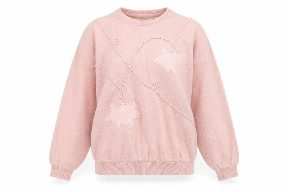 Front view of Essence women’s pink round neck polyester jumper, size M
