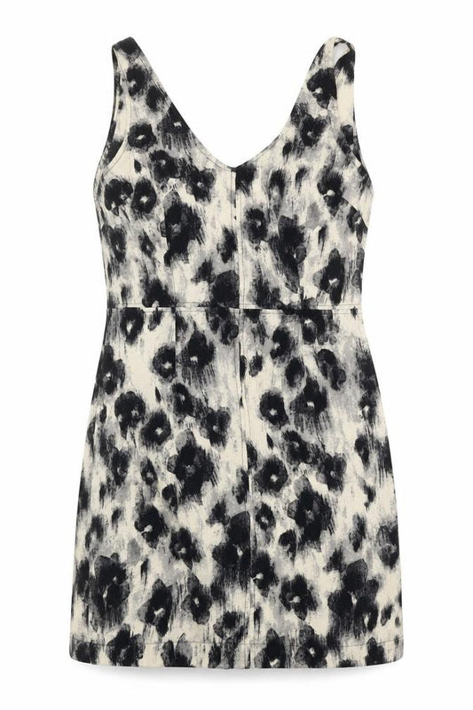 Front view of Sparkle & Fade women’s black geometric polyester a-line, size L, v-neck zip