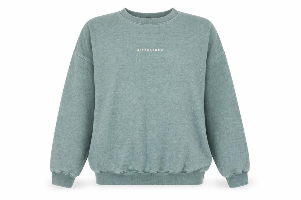 Front view of Missguided women’s green cotton pullover sweatshirt, size UK 6, pullover