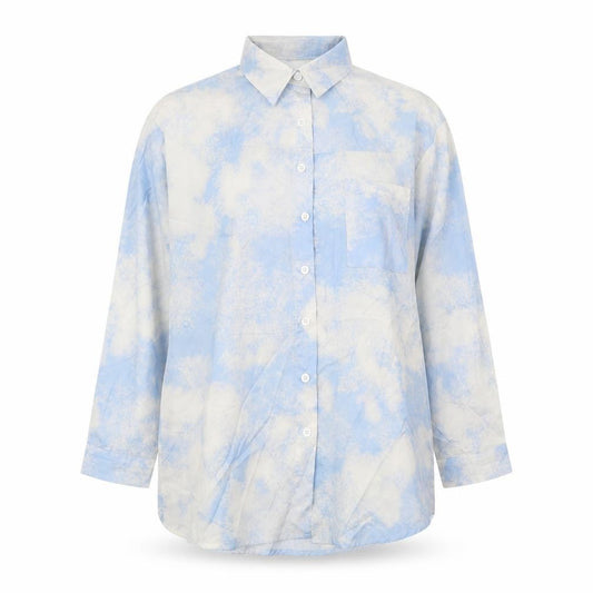 Front view of DAZY women’s blue geometric cotton basic button-up, size S, v-neck