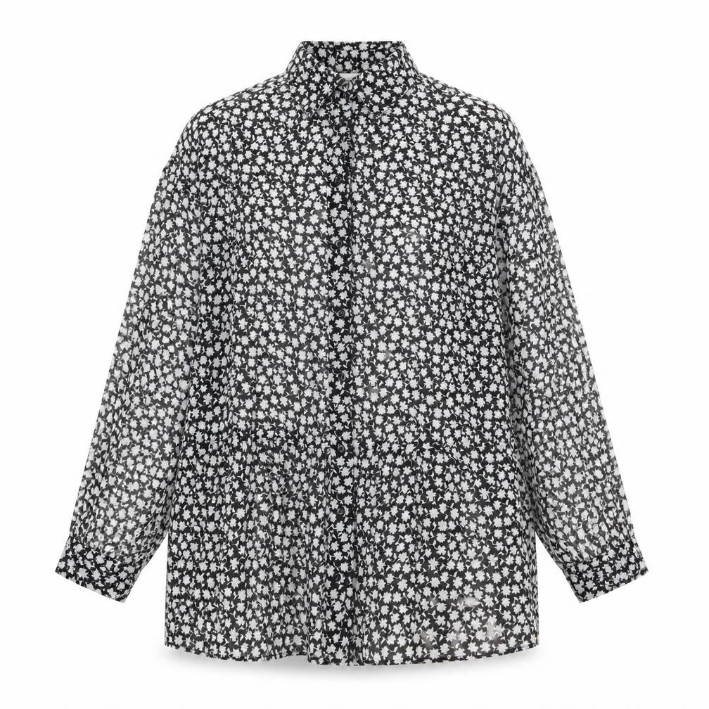 Front view of H&M women’s black geometric polyester shirt dress, size UK 6, collared button