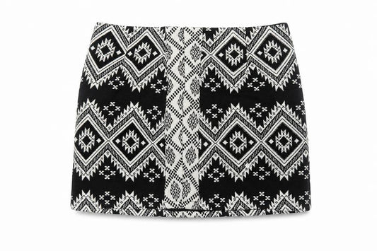 Front view of Marks & Spencer women’s black geometric cotton bandage skirt, size UK 18, zip