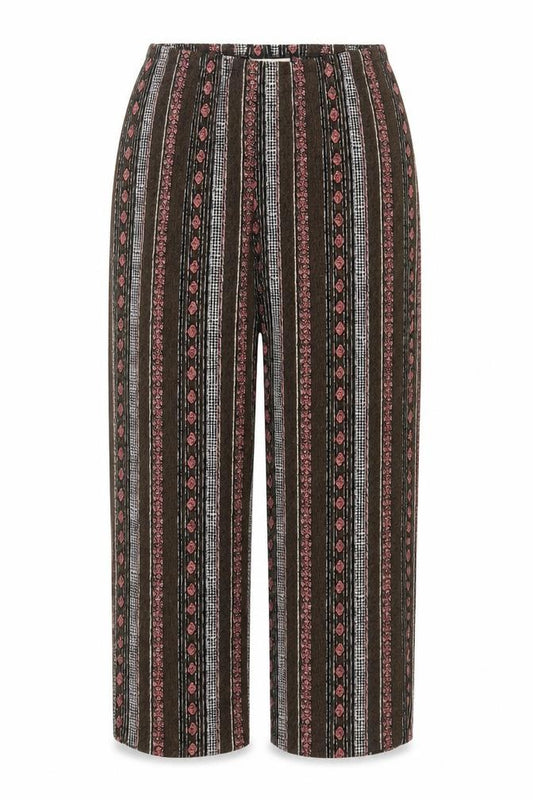 Front view of Tradition women’s multicoloured geometric polyester trousers, size UK 30, in regular