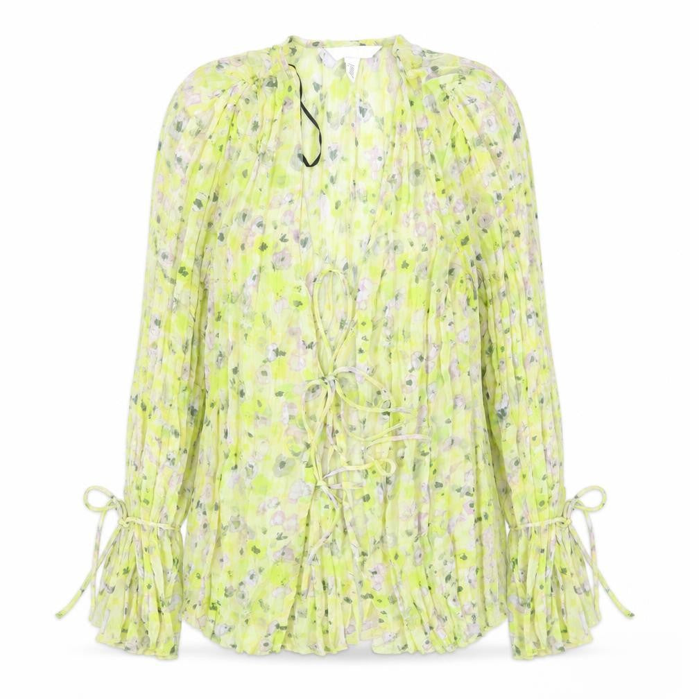 Front view of H&M women’s yellow floral polyester basic blouse, size M, v-neck