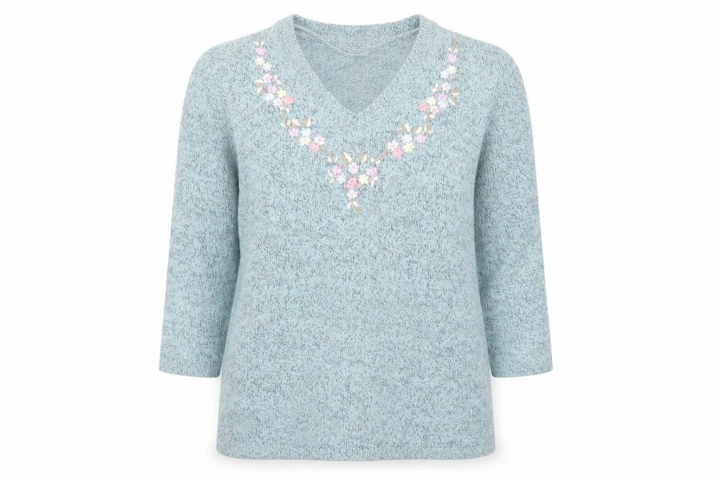 Front view of Damart women’s blue v-neck polyamide jumper, size UK 8