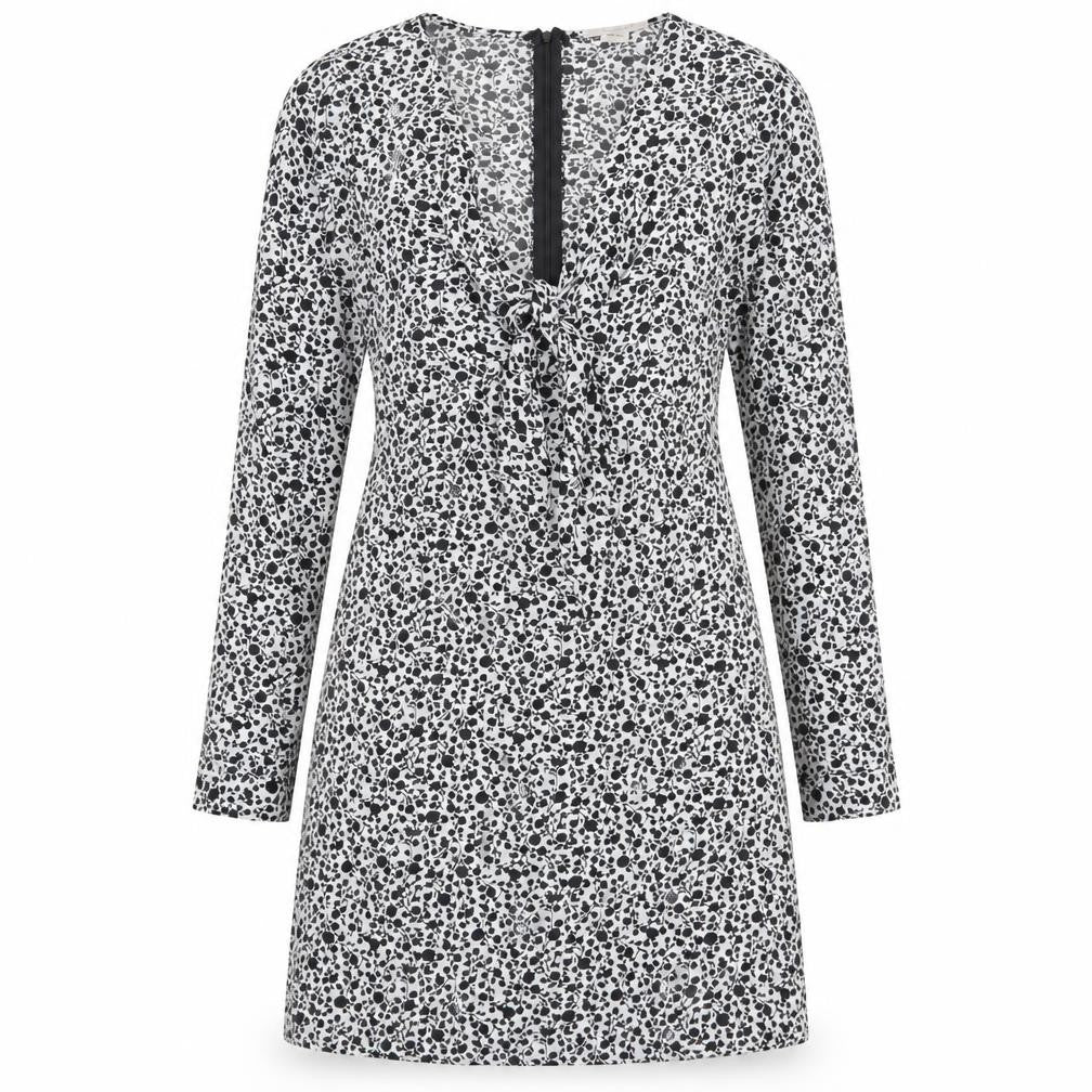 Front view of Glamorous women’s white floral polyester a-line, size UK 8, v-neck zip