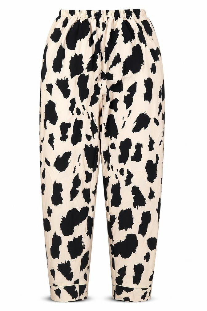 Front view of Preworn women’s beige geometric polyester trousers, size M, 28-inch leg regular