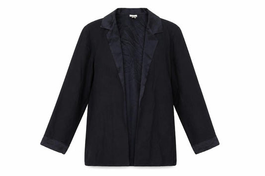 Front view of St Michael women’s black polyester basic blouse, size UK 12, collared