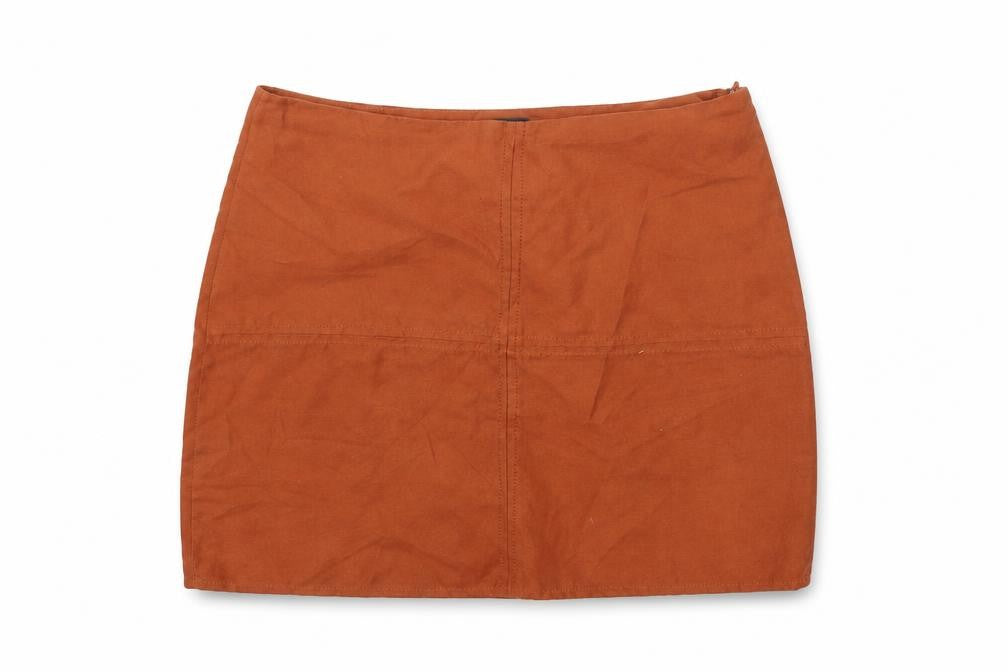 Front view of Primark women’s orange polyester mini skirt, size UK 10, zip